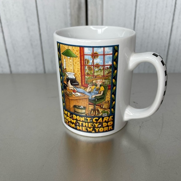 Mary Engelbreit We Don't Care How They Do It In New York coffee Mug - Picture 1 of 6